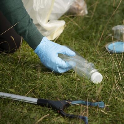 person-collecting-festival-trash-min